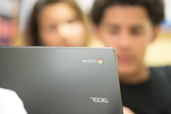 Student with Chromebook
